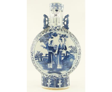 A Chinese blue and white moon flask
with designs of figures in a garden, and 4 character mark, height 13.5".