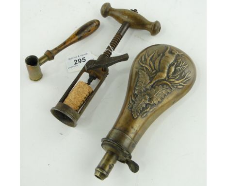 A copper powder flask
with design of a hare, 7.75", a shot measure and a corkscrew, (3).