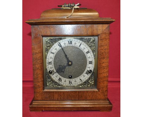 Edwardian mahogany bracket clock,
having a 3-train striking movement, height 10".
