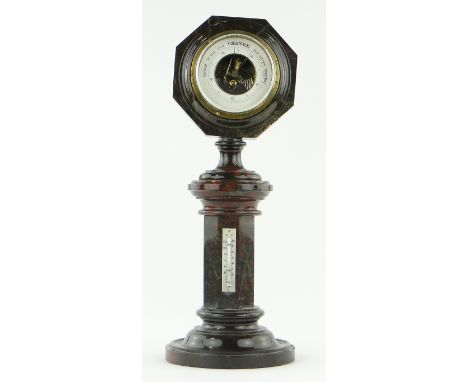 A serpentine marble desk barometer and thermometer
on serpentine stand, height 16.5".