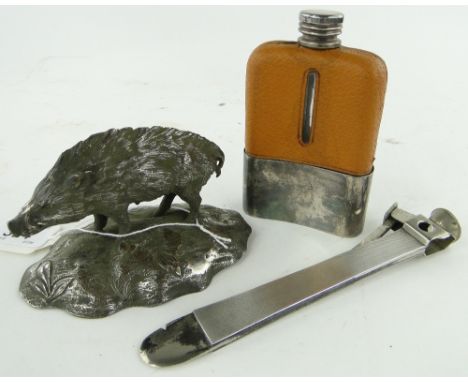 A silver mounted cigar cutter, 
7", a silver plated hip flask and a silver plated wild boar, (3).