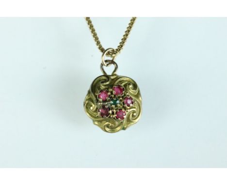 Ruby and emerald yellow metal pendant with flat curb box link 18ct gold chain, length approx 39cm 