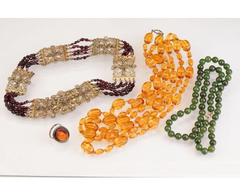 Jade bead necklace with 9ct gold clasp, bead diameter approx 8mm, length approx 56cm; a garnet white metal filigree necklace,