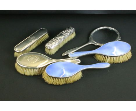 Collection of six silver mounted dressing table items to include a pink guilloche enamel Art Deco hand mirror (Birmingham 193