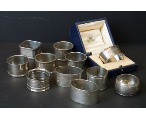 Collection of 11 silver napkin rings to include a cased Mappin &amp; Webb Art Deco example (Birmingham 1935), a pair of Tessi