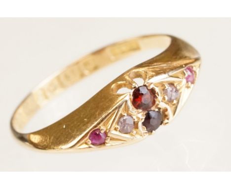 Early 20th century garnet, diamond and pink sapphire 18ct gold boat head ring, two garnets, two small pink sapphires and two 