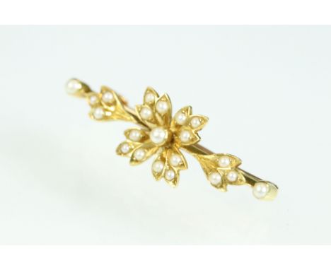 Early 20th century seed pearl unmarked yellow gold spray brooch, full set with seed pearls, length approx 3.5cm 