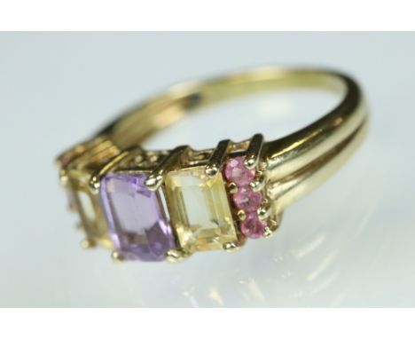 Amethyst, citrine and pink tourmaline 9ct yellow gold ring, the centre step cut amethyst measuring approx 6.5mm x 5mm, the st