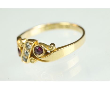 Late 19th century ruby and diamond 18ct yellow gold ring, three small round eight cut diamonds set to the diagonal, two round