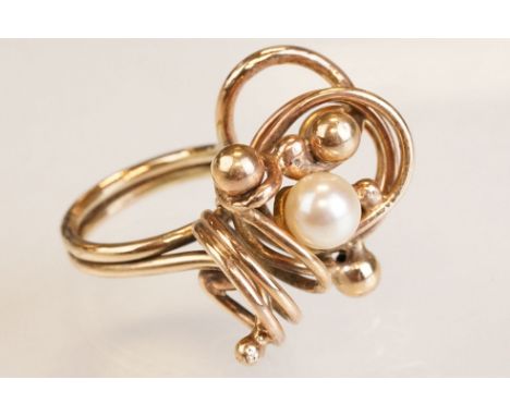 Pearl 9ct gold asymmetric ring, the cream cultured pearl diameter approx 7mm, sphere and loop design, ring size M 