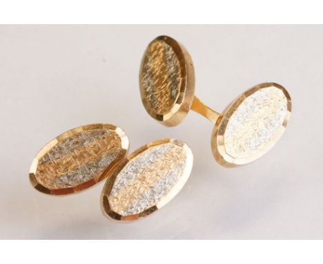 18ct gold bi-colour cufflinks, two oval textured and faceted panels, bar links, dimensions of each panel approx 17mm x 9mm 