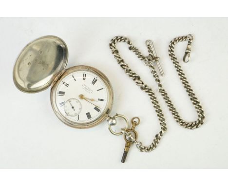 19th Century Irish silver full hunter pocket watch with double albert watch chain. The watch having a plain case opening to r