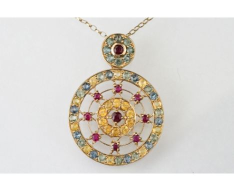 Ruby and fancy coloured topaz 9ct gold pendant necklace, set with rubies, yellow topaz, blue and pale green-blue topaz, possi