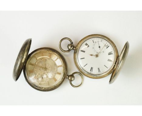 Silver full hunter key wind pocket watch, silvered dial and seconds dial, Roman numerals in relief, engine turned case, vacan