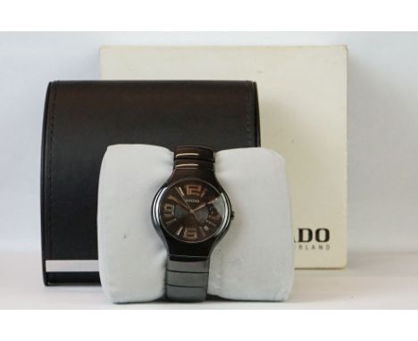 A gents RADO Swiss made black ceramic wristwatch, date function to 4 o'clock, complete with boxes, papers and guarantee card.