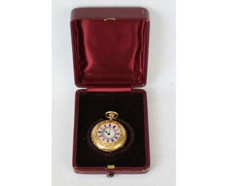 Enamelled 18ct yellow gold half hunter top wind fob watch, the case with engraved foliate and scroll decoration, pink guilloc