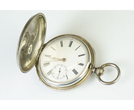 Victorian silver full hunter key wind pocket watch, white enamel dial and seconds dial, black Roman numerals, engine turned c