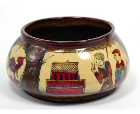 An antique French Faience Louis Etienne DESMANT (1844-1902), a pottery bowl hand painted with scenes from The Bayeux Tapestry