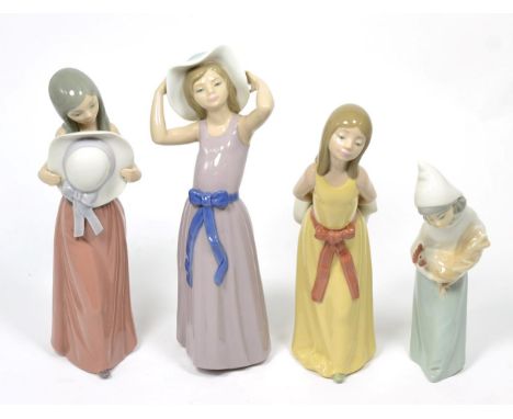 Four Lladro china figures of young girls 