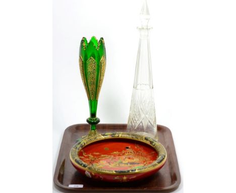 A gilt decorated green Bohemian glass vase; a Carlton ware bowl and a tall decanter 