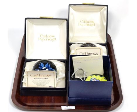 Three boxed paperweights: Caithness 'Flamenco', 'Blue Floral Fountain' and Highland Paperweights Butterfly design by Paul Ysa