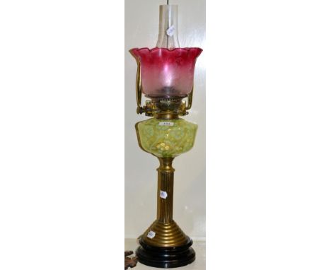 A Victorian oil lamp  