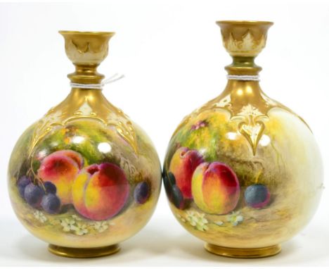 A matched pair of Worcester fruit study vases, signed Ricketts 