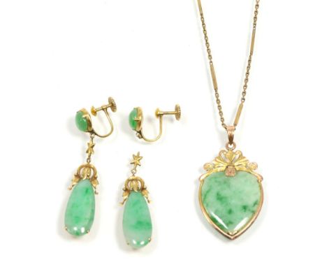 A jade pendant necklace, a heart-shaped jade plaque in a fancy frame and on a long and short bar link necklace, pendant measu