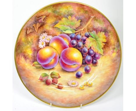 A Royal Worcester fruit plate, signed D Fuller, black printed mark 