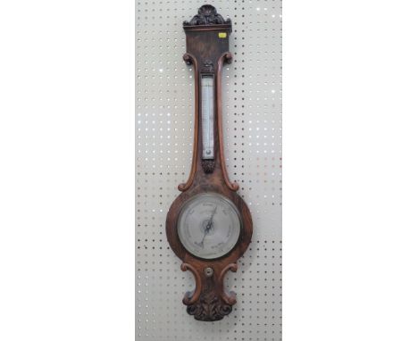 An Oak Mercury  barometer. Circa 1880. With thermometer. 