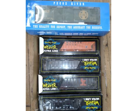 Four Weaver Models O gauge Hopper Wagons and Pecos River Santa fe Box car in window boxes. (5) 