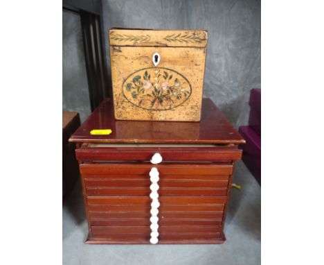 A specimen box fitted with numerous drawers  and a tea caddy. Both antique. 