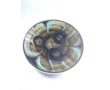 A Poole Pottery plate. 