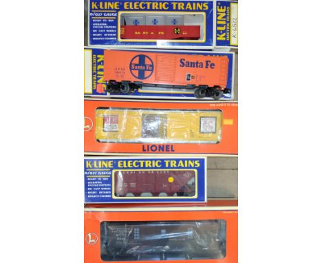 Lionel O gauge yellow Union Pacific Box Car and Western Union Telegraph Co. Tool Car in window boxes, and three by other make