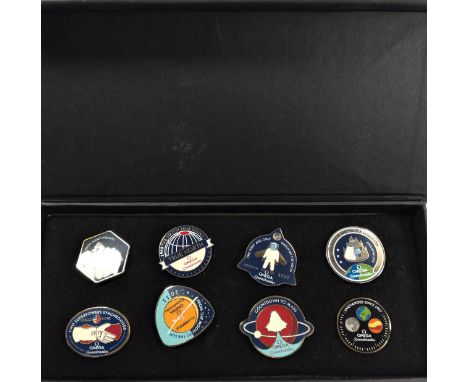 Omega Speedmaster 50th anniversary boxed commenorative set of eight enamel pins. 1957-2007 limited edition. 