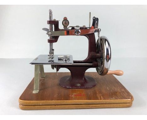 Vintage toys,  1950s vintage child's sewing machine the Essex Mk1 inc sewing platform.