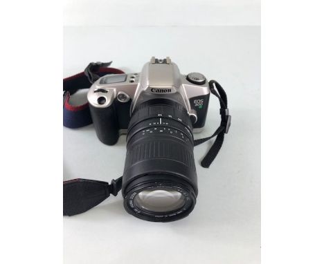 Photographic interest, Canon EOS 500  automatic 35mm camera with 100-300 mm  zoom lens 