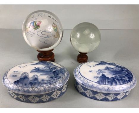 Chinese Art, Two Blue and white ceramic oval shaped pots with geometric patterns the lids with painted landscapes, and two gl