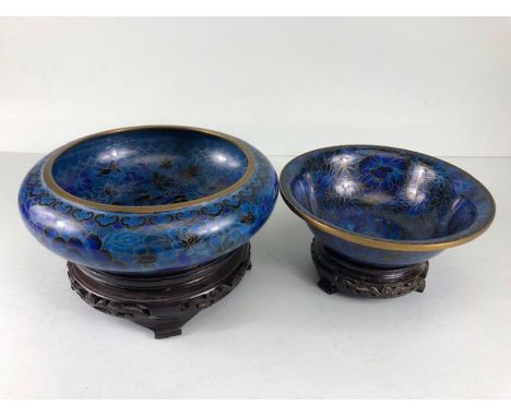 Chinese Cloisonne, 2 Cobalt blue Cloisonne Enamel bowls on wooden stands, the larger approximately 20cm diameter, the other a
