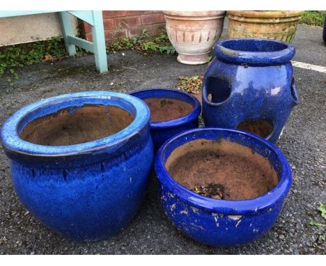 Collection of four blue glazed garden pots 