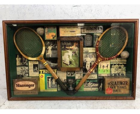 Sporting memorabilia, Framed display of Lawn Tennis items, comprising of Rackets, Balls trophy's, advertising boxes, pamphlet