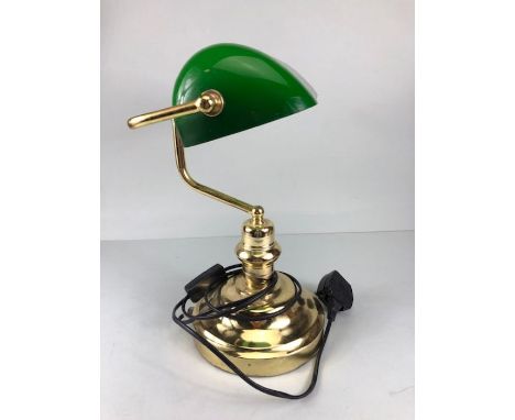 Desk lamp, 20th century Clarks desk lamp, yellow metal base with green glass shade.