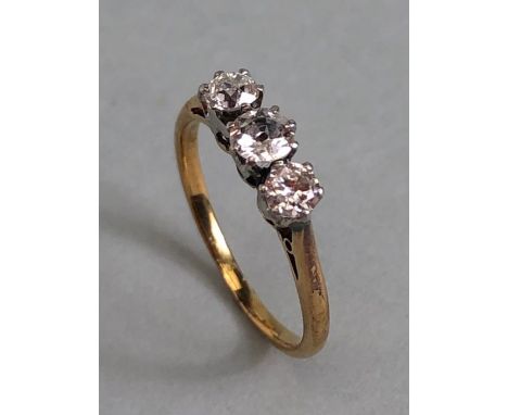 Three stone Diamond ring on yellow Gold size approx K