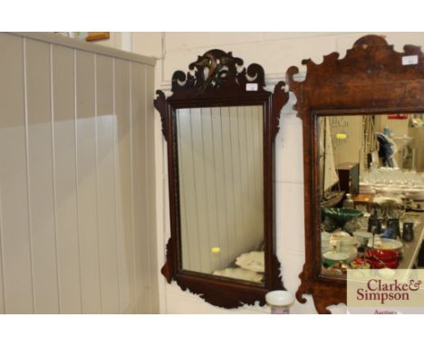 A mahogany Chippendale design fret carved wall mirror with gilt Ho Ho bird decoration