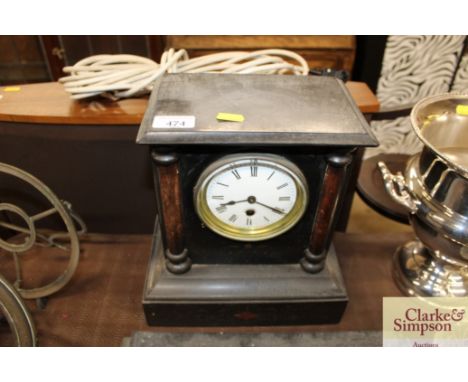 A slate single hole mantel clock
