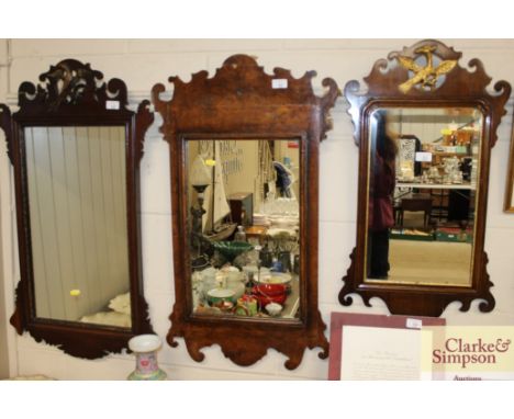 A Chippendale design walnut fret carved wall mirror 