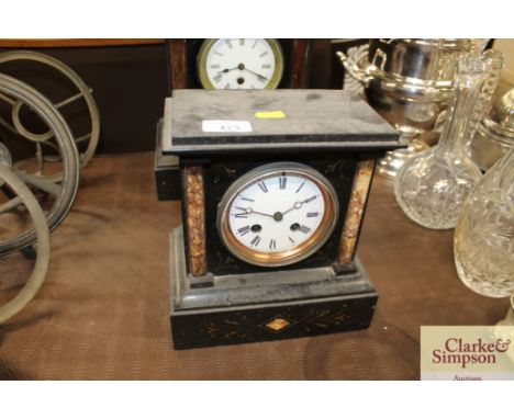 A two hole slate mantel clock