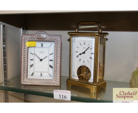 A small silver mounted mantel clock; and a brass cased carriage clock 