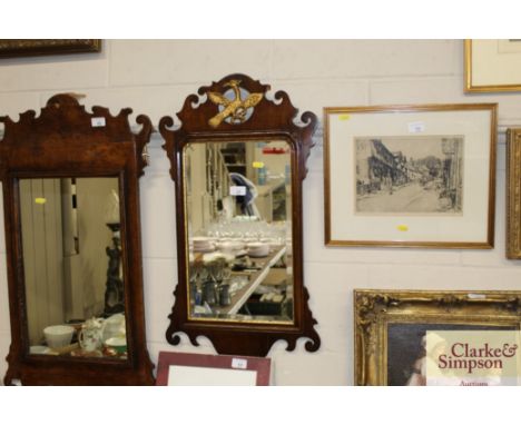 A mahogany Chippendale style fret carved wall mirror with gilt ho ho bird decoration