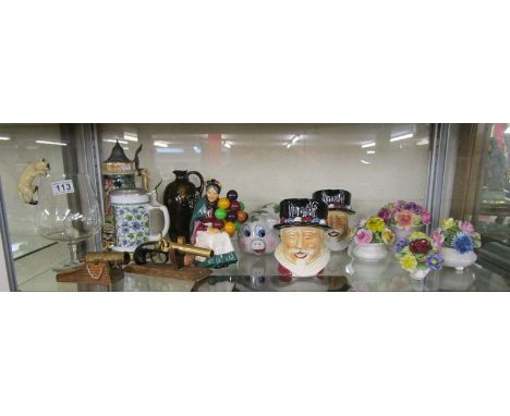 Shelf of collectables to include The Balloon Seller